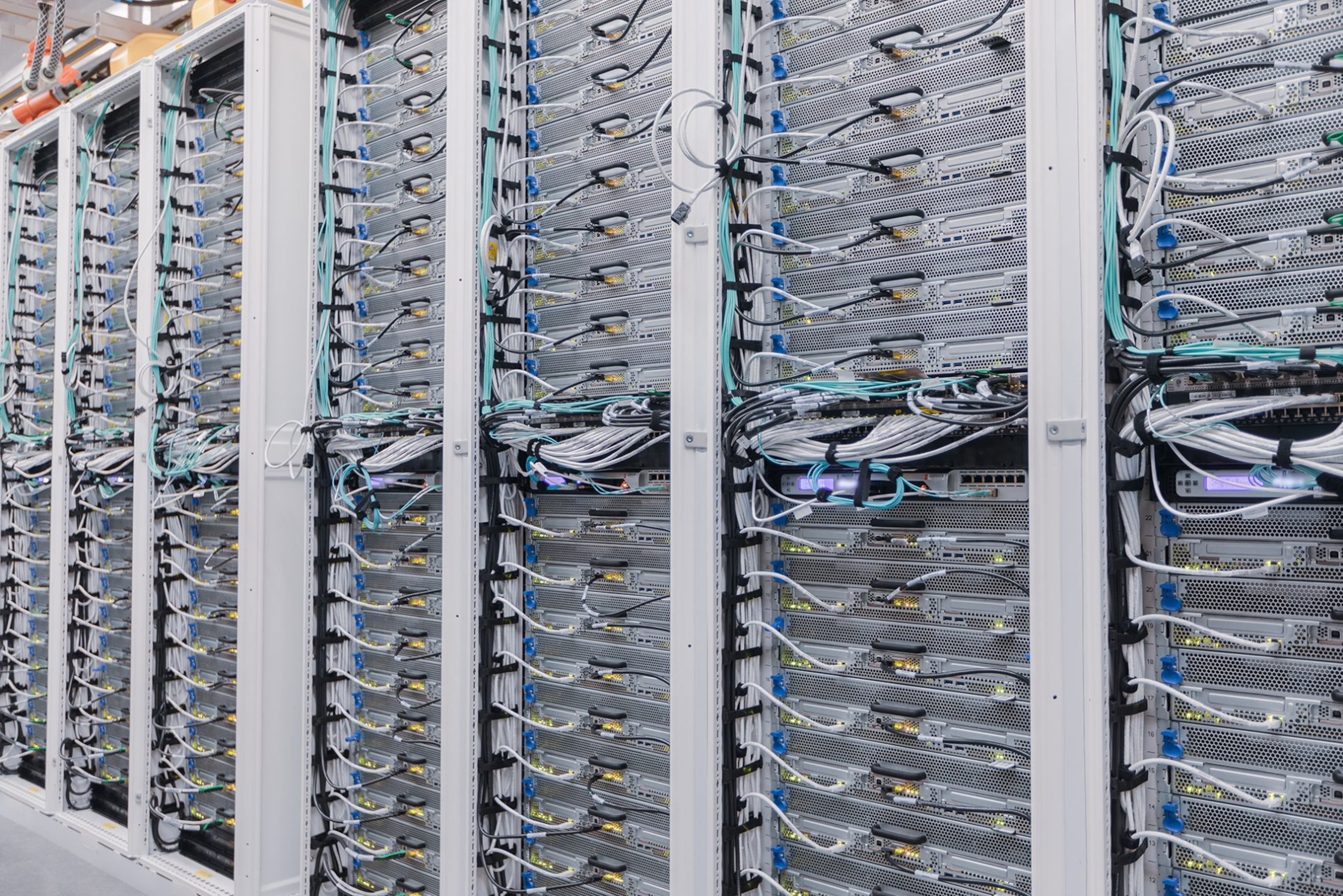 Data centers, with their many racks of computers and storage blades, create an economy of scale that is far more efficient and secure than having computer storage spread out among various offices and institutions. (Courtesy of Microsoft)