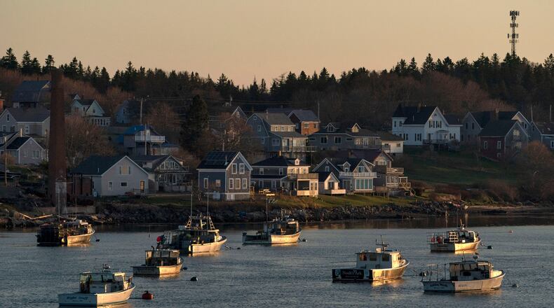 FILE - Lobster boats sit at their moorings in Jonesport, Maine, April 28, 2023. (AP Photo/Robert F. Bukaty, files)