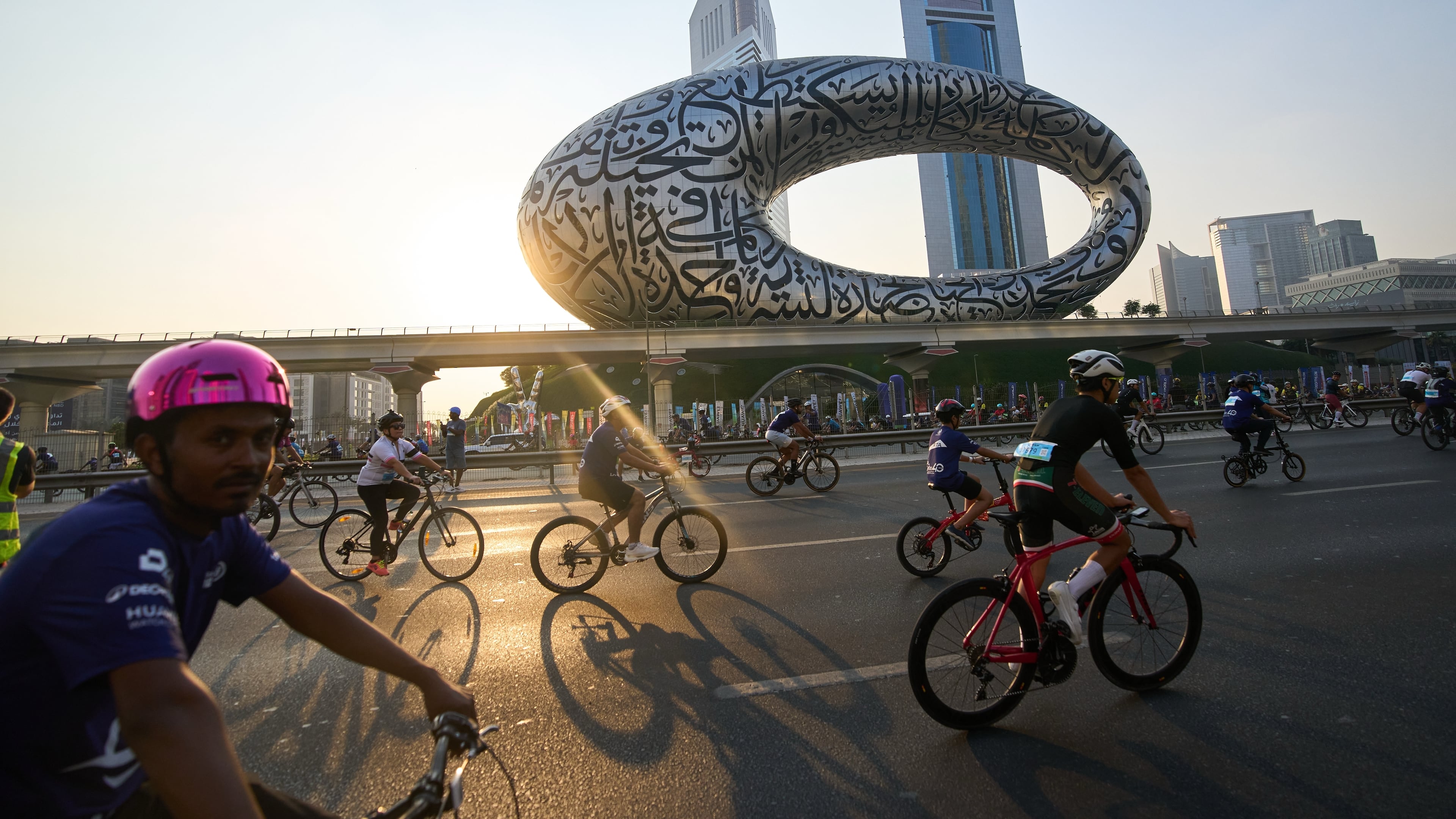 Bicyclists ride along Sheikh Zayed highway during the Dubai Ride annual event in Dubai, United Arab Emirates, Sunday, Nov. 2, 2025. (AP Photo/ Fatima Shbair)