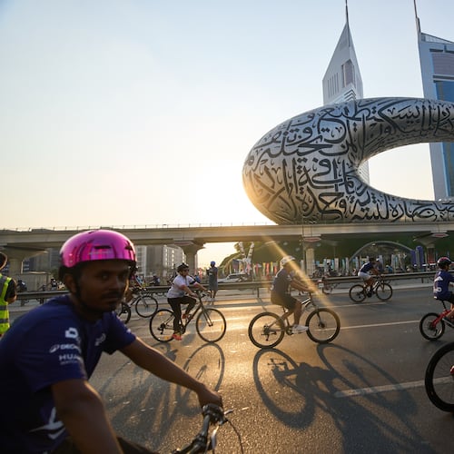 Bicyclists ride along Sheikh Zayed highway during the Dubai Ride annual event in Dubai, United Arab Emirates, Sunday, Nov. 2, 2025. (AP Photo/ Fatima Shbair)