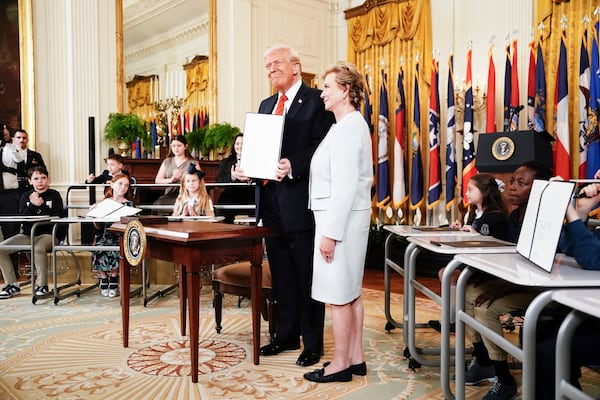 President Donald Trump with Education Secretary Linda McMahon after he signed an executive order that would diminish the Department of Education in East Room of the White House in Washington, on Thursday, March 20, 2025. President Trump signed an executive order that he said would “begin eliminating the federal Department of Education once and for all,” although the agency cannot be closed without the approval of Congress (Haiyun Jiang/The New York Times)
                      
