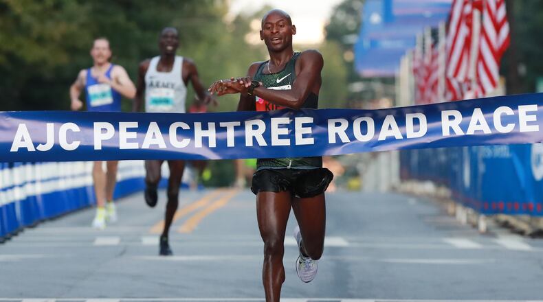 Bernard Kip Lagat wins the AJC Peachtree Road Race on Wednesday, July 4, 2018, in Atlanta. Curtis Compton/ccompton@ajc.com