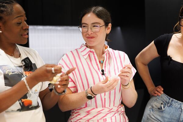AJC social media producer Abbey Edmonson participates in the “Best Banana Pudding” video shoot for the AJC in Atlanta on Wednesday, Aug. 5, 2026. (Estela Muñoz/AJC)
