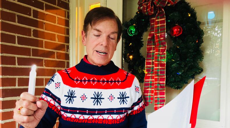 Bob Gibeling leads a group that has been caroling in Atlanta’s Garden Hills neighborhood for 25 years. Ann Hardie for the AJC