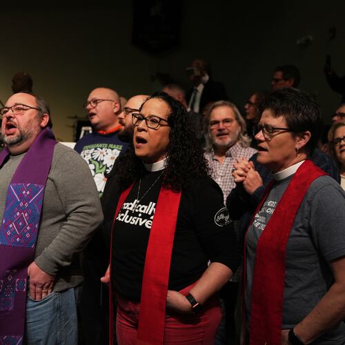 Faith leaders sing together as a sign of support for Haitian migrants fearing the end of their Temporary Protected Status in the U.S., at an event held at St. John Missionary Baptist Church in Springfield, Ohio on Monday, Feb. 2, 2026. (AP Photo/Luis Andres Henao)