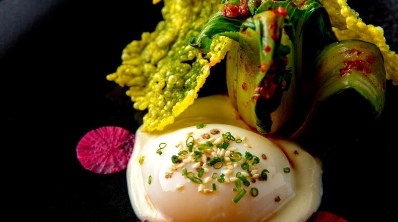 The pan Asian egg at The Alden is made with soft coddled farm egg, bok choy, ginger and rice cracker. / Photo by Chip Bergmann