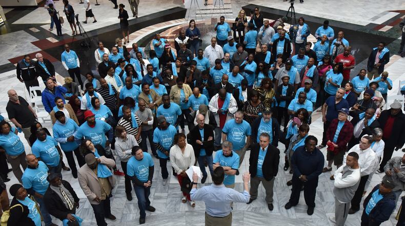 March 30, 2016 Atlanta - Luke Marlin, general manager of Uber Atlanta, speaks to Uber drivers and supporters before the Transportation Committee hearing on the airport’s draft proposal for ridesharing operations at Atlanta City Hall on Wednesday, March 30, 2016. HYOSUB SHIN / HSHIN@AJC.COM