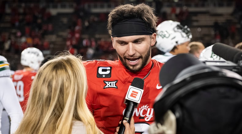 FILE - Cincinnati quarterback Brendan Sorsby (2) is interviewed after a NCAA college football game against Baylor, Oct. 25, 2025, in Cincinnati. (AP Photo/Tanner Pearson, File)