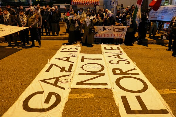 People protest against an Israeli drone attack on a vessel carrying aid to Gaza in international waters off Malta, outside the Israeli consulate in Istanbul, Friday, May 2, 2025. (AP Photo/Khalil Hamra)