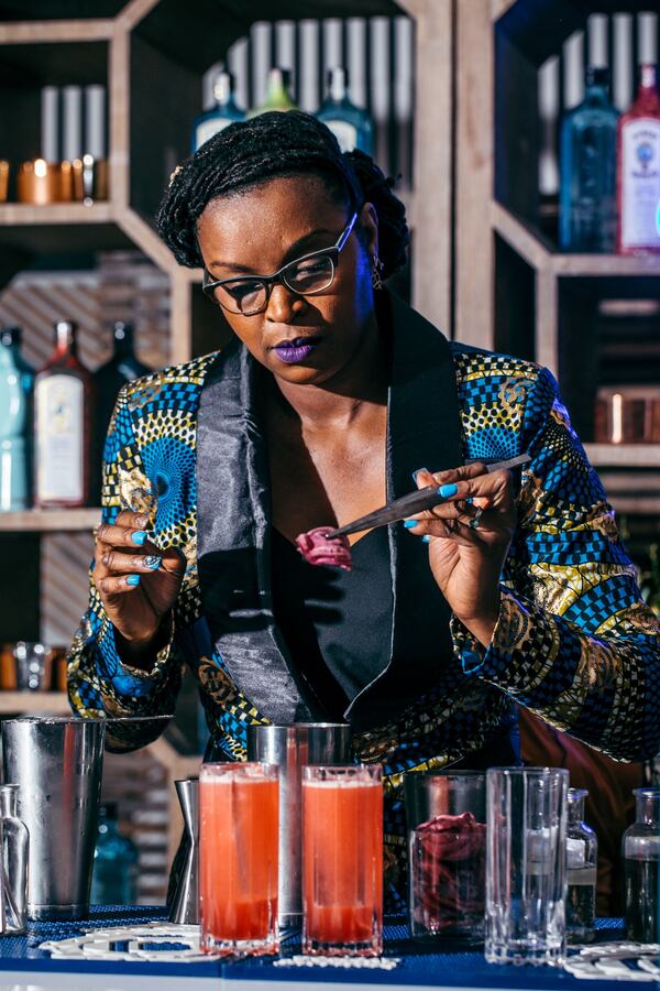 Keyatta Mincey-Parker mixes drinks early this year. (Courtesy of Bombay Sapphire)
