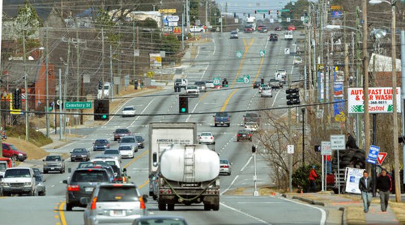 Buford Highway, which runs from DeKalb County through the Gwinnett cities of Norcross, Duluth and Suwanee, has been a congested roadway with lots of signs.