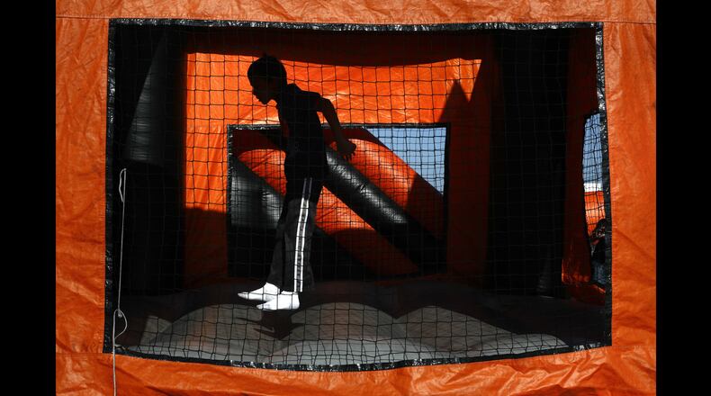 A child plays in a bounce house April 9, 2017, in Anaheim, Calif.