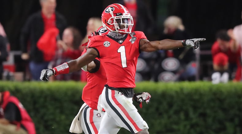 Georgia wide receiver George Pickens celebrates his touchdown catch for a 17-0 lead over Auburn during the second quarter in a SEC college football game on Saturday, Oct 3, 2020 in Athens.