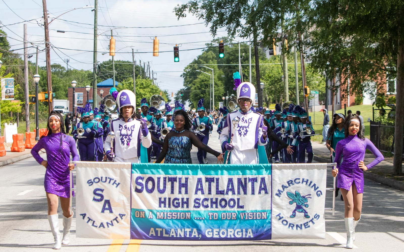 The South Atlanta High School marching band marches during the Atlanta Public School parade on Saturday, April 22, 2023. The parade celebrated the 150th anniversary of Atlanta Public Schools and featured students, teachers and other members of the APS community. CHRISTINA MATACOTTA FOR THE ATLANTA JOURNAL-CONSTITUTION