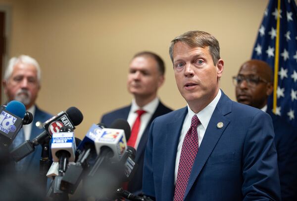 Acting U.S. Attorney Alexander C. Van Hook speaks during a press conference announcing the indictment of current and former police officers on fraud and conspiracy charges, Wednesday, July 16, 2025, at the Lafayette Federal Courthouse in Lafayette, La. (Brad Bowie/The Times-Picayune/The New Orleans Advocate via AP)
