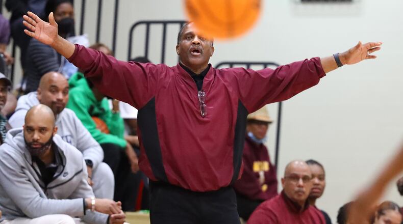 030222 Loganville: Forest Park head coach Steven Cole calls a defense against Loganville in their high school basketball tournament game on Wednesday, March 2, 2022, in Loganville.  “Curtis Compton / Curtis.Compton@ajc.com”`