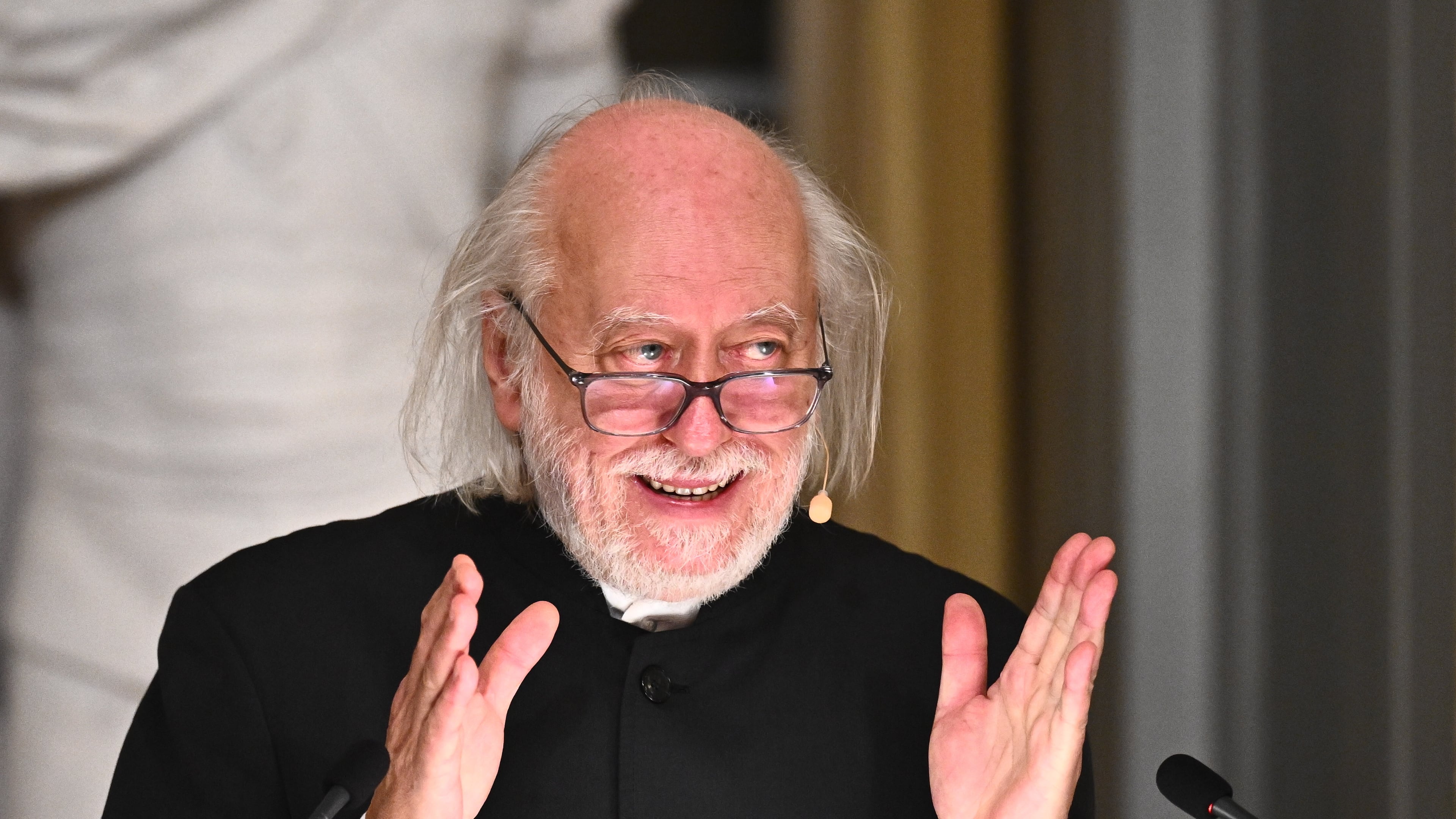 Laszlo Krasznahorkai, Nobel Prize laureate in Literature, delivers his Nobel Prize lecture in Stockholm, Sweden, Sunday Dec. 7, 2025. (Claudio Bresciani/TT News Agency via AP)