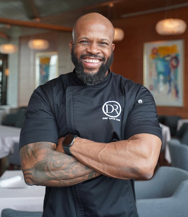 David Rose, chef and barbecue expert, stands facing the camera with his arms crossed.