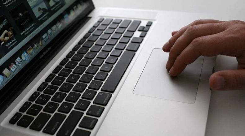 A software company is working to expand access to high-speed internet in Cherokee County. AJC FILE