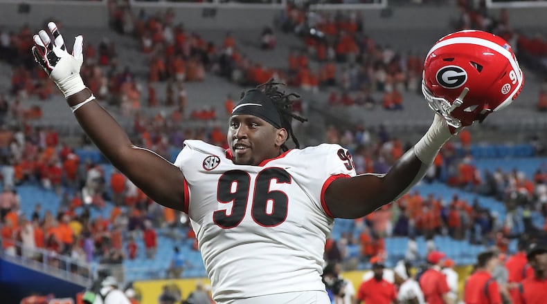 Georgia defensive lineman Zion Logue reacts after a 10-3 victory over Clemson. (Curtis Compton / Curtis.Compton@ajc.com)
