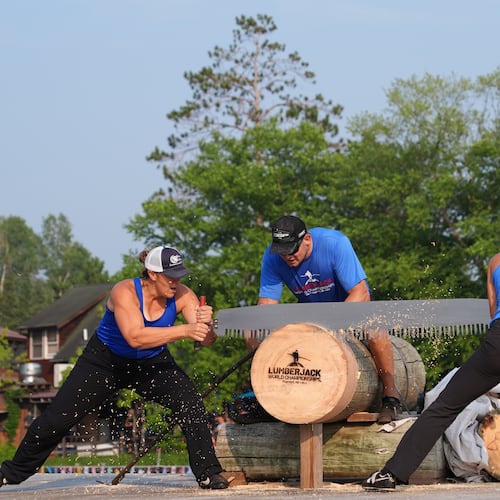 Kate Witkowski, left, and Erin Lavoie compete in the Jill and Jill event during the Lumberjack World Championships, Saturday, July 18, 2026, in Hayward, Wis. (AP Photo/Ellen Schmidt)