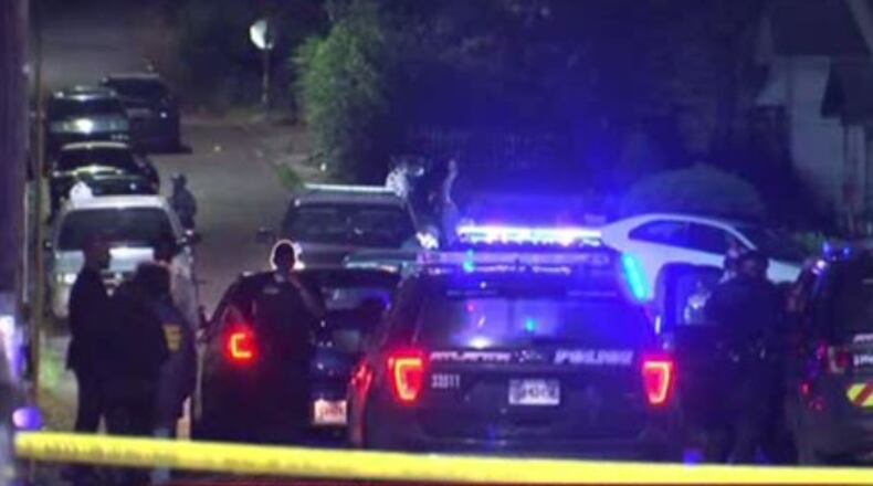 As many as 20 rounds were fired in the shooting Friday morning on Proctor Street in northwest Atlanta, according to police.