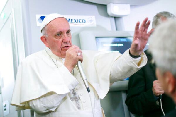 FILE - Pope Francis speaks to journalists aboard the plane during the flight from Ciudad Juarez, Mexico to Rome, where he suggested that women threatened with the Zika virus could use artificial contraception but not abort their fetus, Wednesday, Feb. 17, 2016. (Alessandro Di Meo/Pool Photo via AP, File)