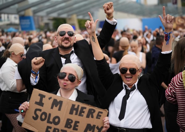 Fans gather in front of the O2 Arena prior to a performance by Pitbull on Monday, June 9, 2025, in London. (Photo by Scott A Garfitt/Invision/AP)