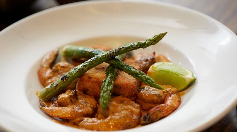 Agave’s Tequila Anejo Shrimp with Roasted Tomato and Serrano Grits
Courtesy of Agave