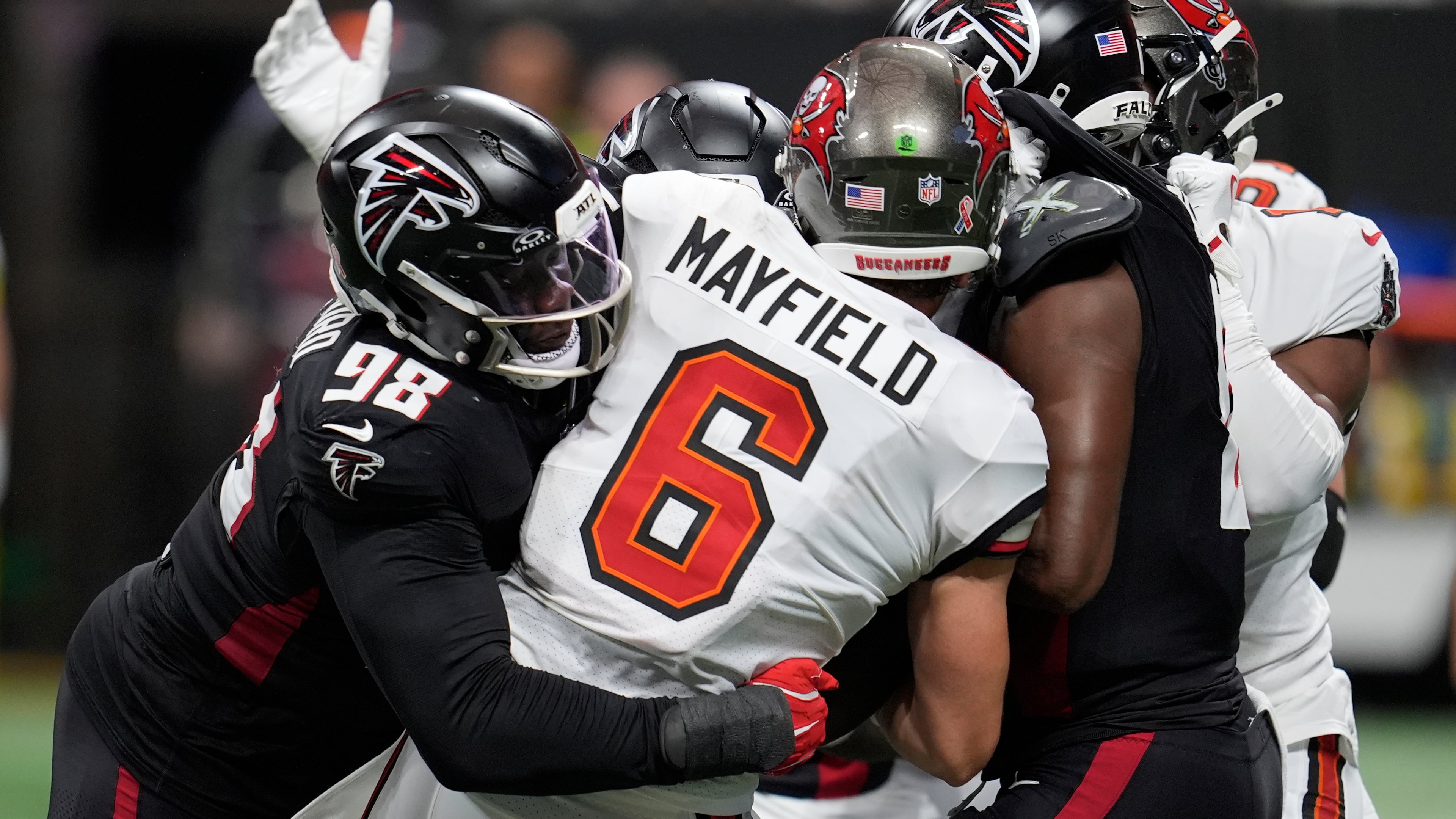Tampa Bay Buccaneers quarterback Baker Mayfield is sacked during the first half of an NFL football game against the Atlanta Falcons, Sunday, Sept. 7, 2025, in Atlanta. (Mike Stewart/AP)