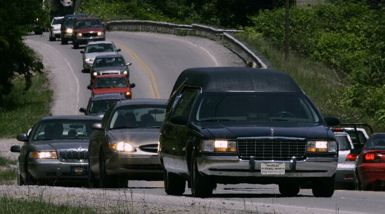 The farther you get outside Atlanta, the more likely people are to pull over when a funeral procession passes. “In Sandy Springs, it ain’t gonna happen,” says Georgia Motor Escort’s Jerry Braswell. Associated Press file photo.