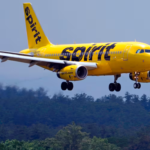 FILE - A Spirit Airlines 319 Airbus approaches Manchester Boston Regional Airport for a landing, June 2, 2023, in Manchester, N.H. (AP Photo/Charles Krupa, File)