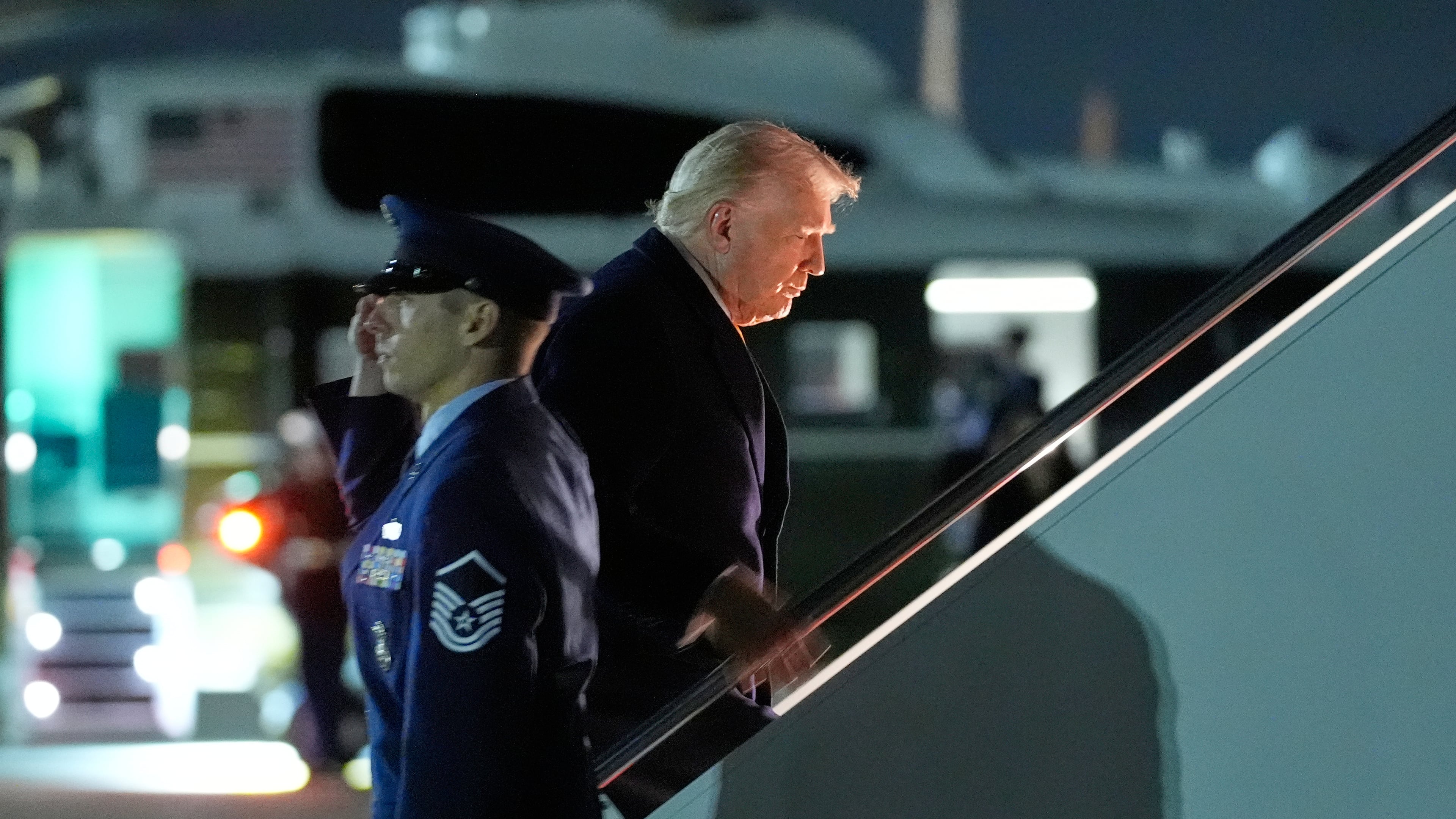 President Donald Trump boards Air Force One at Joint Base Andrews, Md., on his way to his Mar-a-Lago estate in Palm Beach, Fla., Friday, Nov. 14, 2025. (AP Photo/Manuel Balce Ceneta)