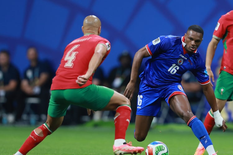 Haiti's Lenny Joseph, right makes move against Morocco's Sofyan Amrabat during first half of Morocco vs. Haiti Group C FIFA World Cup match at Atlanta Stadium (Mercedes-Benz Stadium) on Wednesday, June 24, 2026. (Jason Getz/AJC)