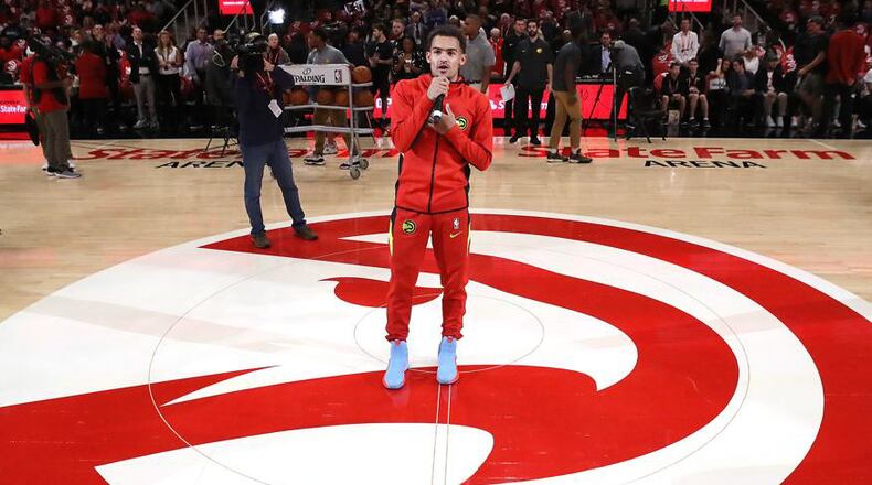 Hawks guard Trae Young welcomes fans to State Farm Arena for this season’s home opener  Oct. 26, 2019.  Curtis Compton / ccompton@ajc.com