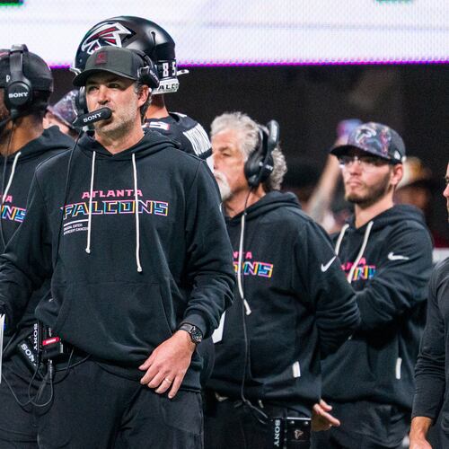 FILE - Atlanta Falcons offensive coordinator Zac Robinson works during the first half of an NFL football game against the Washington Commanders, Sunday, Sep. 28, 2025, in Atlanta. (AP Photo/Danny Karnik, File)
