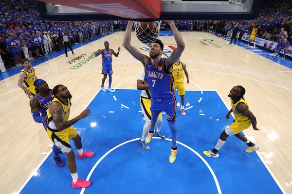 Oklahoma City Thunder forward Chet Holmgren (7) dunks against the Indiana Pacers during Game 7 of the NBA Finals basketball series Sunday, June 22, 2025, in Oklahoma City. (Matthew Stockman/Pool Photo via AP)