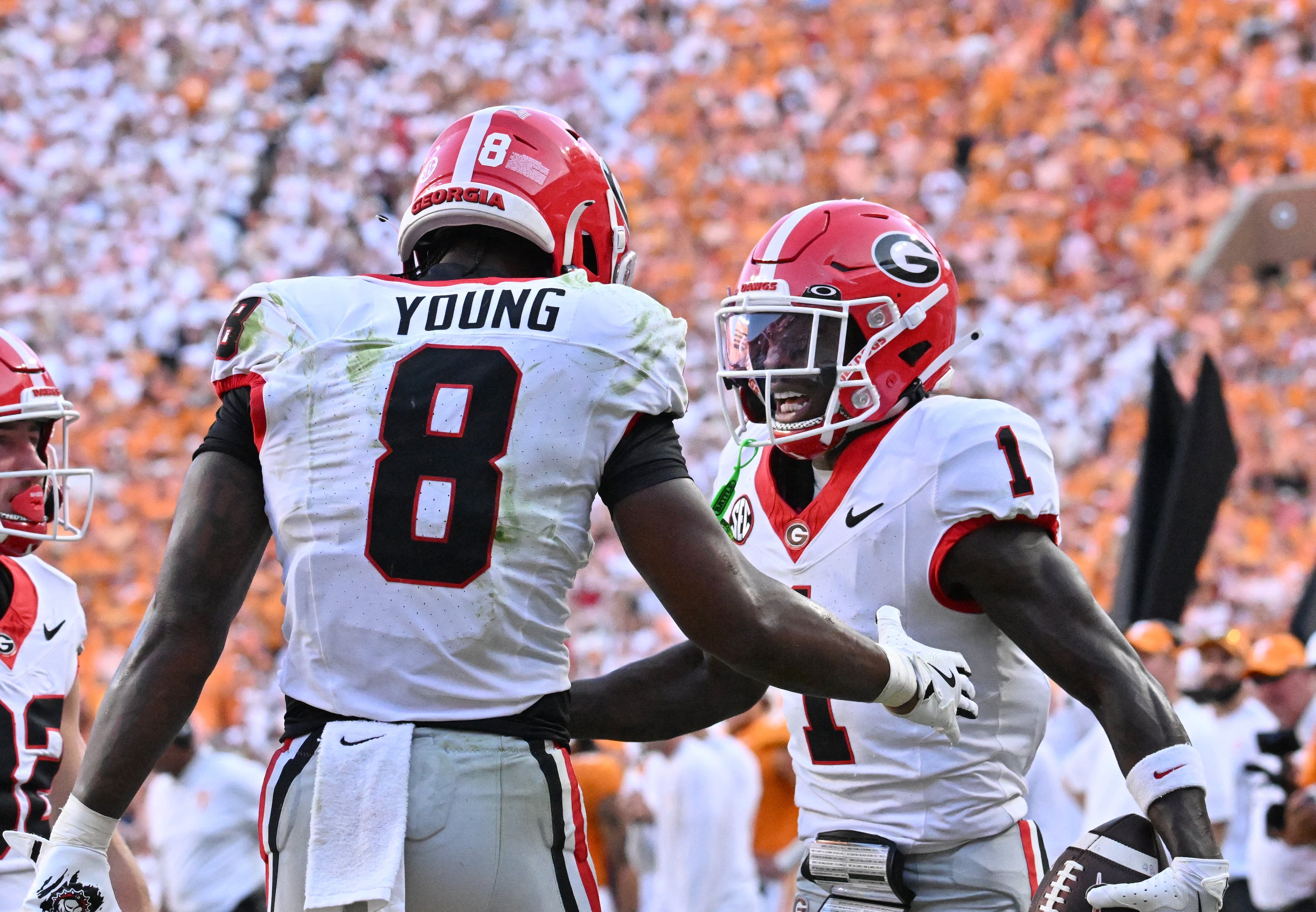 Georgia wide receiver Zachariah Branch (right) celebrates after scoring a 2-point conversion at the end of fourth quarter at Neyland Stadium on Saturday, Sept. 13, 2025, in Knoxville, Tenn. Georgia won 44-41 in overtime. (Hyosub Shin/AJC)
