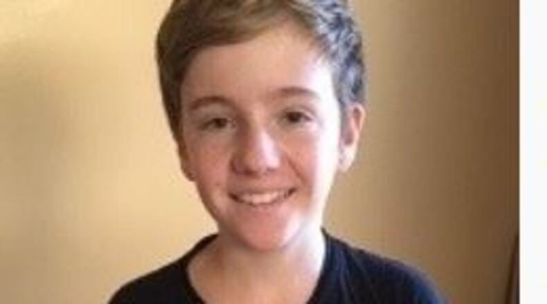 A DeKalb school board member feels it was unfair of the school to ask his son to change this anti-CNN shirt before a tour of the Atlanta CNN studios. The school has apologized to Stan Jester. (Photo from Jester's blog.)