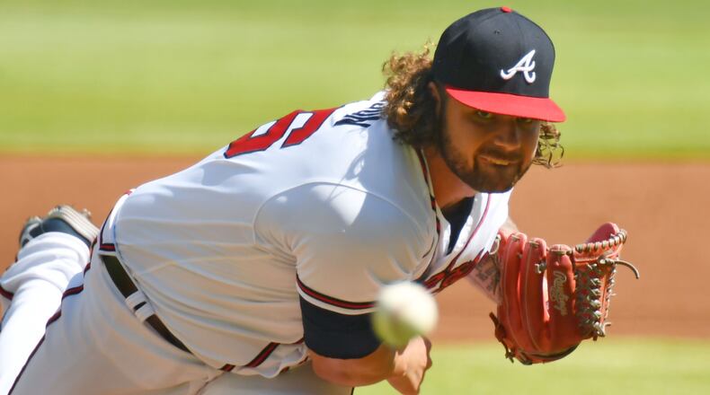 Bryse Wilson throws a pitch for the Braves at Truist Park on Saturday, May 22, 2021. (Hyosub Shin / Hyosub.Shin@ajc.com)