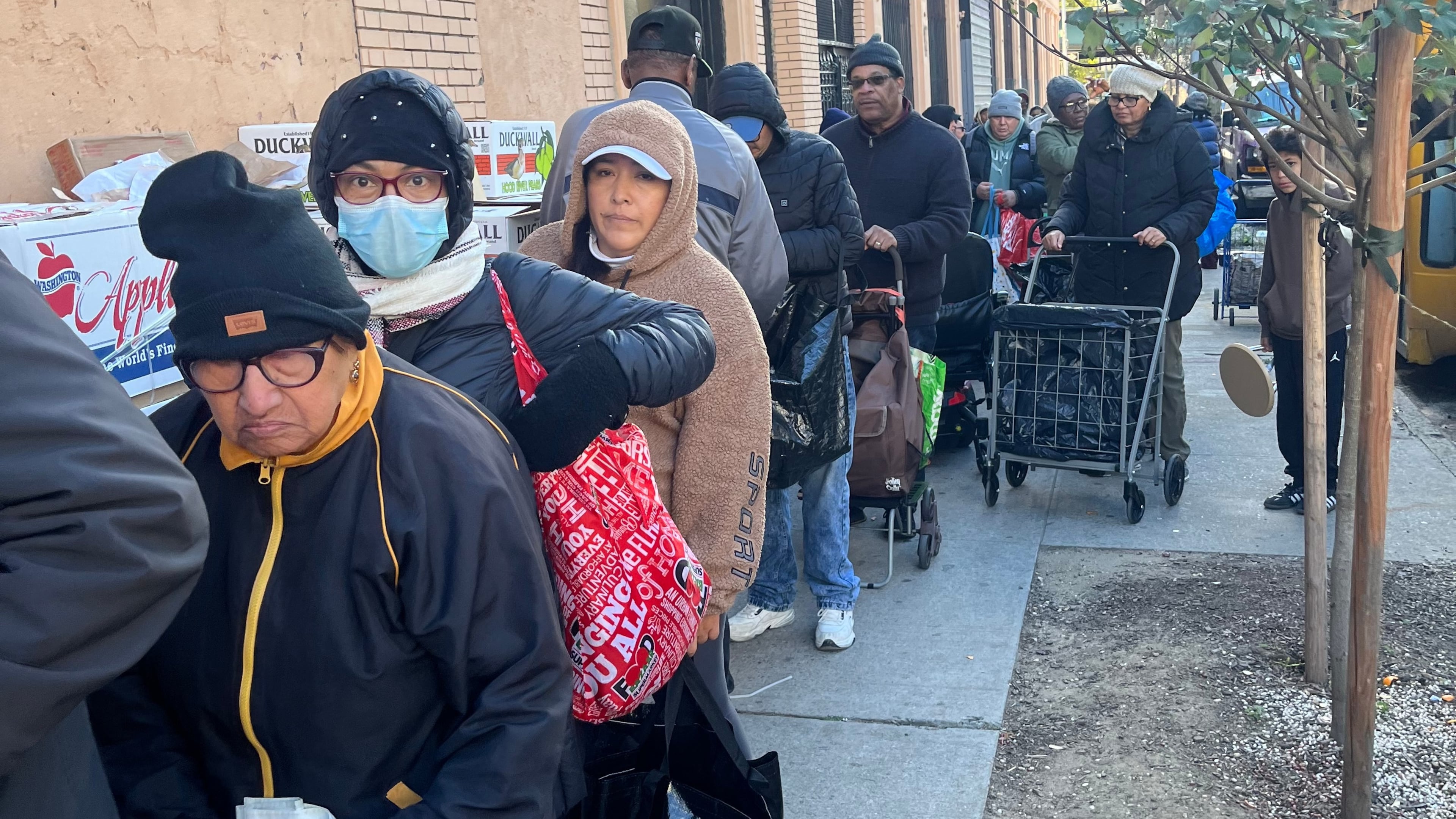 CORRECTS BYLINE TO REV. JOHN UDO-OKON, NOT SUSAN HAIGH - In this photo provided by the Rev. John Udo-Okon, people wait in line for free food at the World of Life Christian Fellowship International food pantry in the Bronx borough of New York on Saturday, Nov. 1, 2025. (Rev. John Udo-Okon via AP)