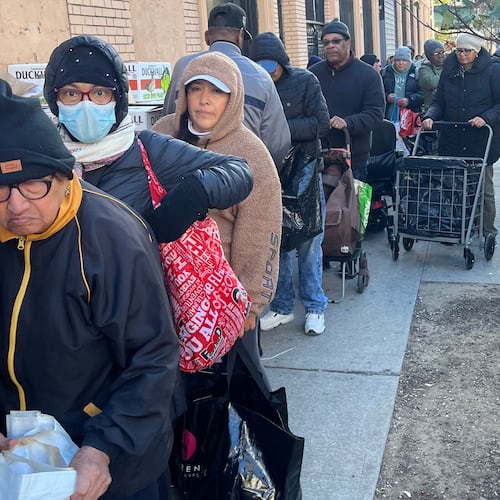 CORRECTS BYLINE TO REV. JOHN UDO-OKON, NOT SUSAN HAIGH - In this photo provided by the Rev. John Udo-Okon, people wait in line for free food at the World of Life Christian Fellowship International food pantry in the Bronx borough of New York on Saturday, Nov. 1, 2025. (Rev. John Udo-Okon via AP)