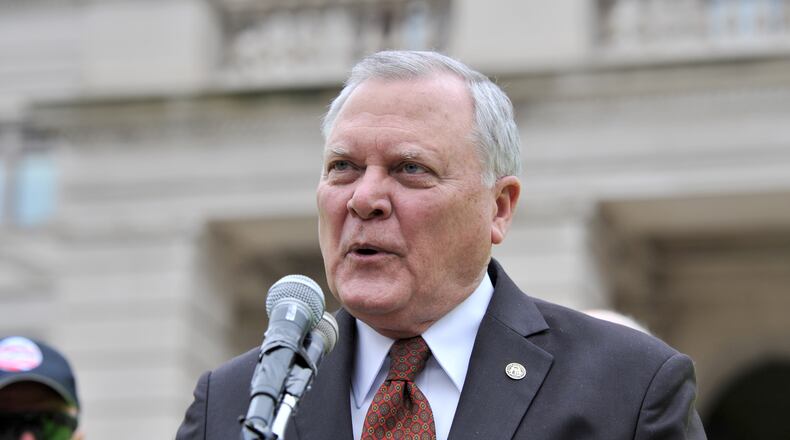 March 18, 2014 Atlanta - Gov. Nathan Deal speaks during the ninth annual Georgia Rides to the Capitol on Tuesday, March 18, 2014. Metro Atlanta Mayors Association (MAMA), GEORGIA BIKES! and event sponsors host more than 1,000 cyclists from the metro Atlanta region for the ninth annual Georgia Rides to the Capitol. Police escorted rides depart from Decatur and Roswell. HYOSUB SHIN / HSHIN@AJC.COM