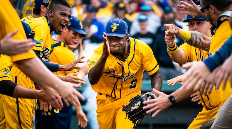 Savannah Banana Malachi Mitchell (2) and other members of the starting lineup take to the field for a Banana ball game against the Kansas City Monarchs at Legends Field on Friday, May 6, 2022, in Kansas City, Kansas. (Kent Nishimura/Los Angeles Times/TNS)