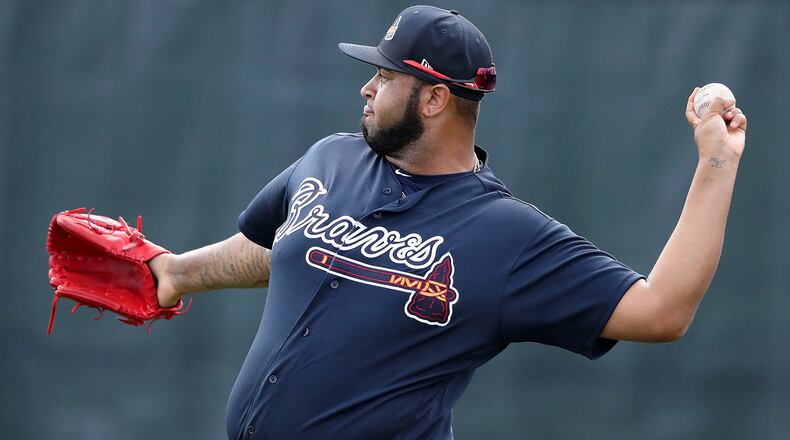 Luiz Gohara loosens up during a Feb. 21 workout. He injured his groin and hasn’t pitched yet in a game.