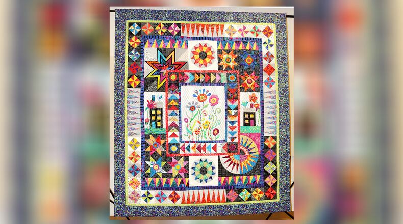 The 17th annual Georgia Celebrates Quilts Show will feature a raffling of Celebration, a quilt created by 69 members of the East Cobb Quilters Guild.