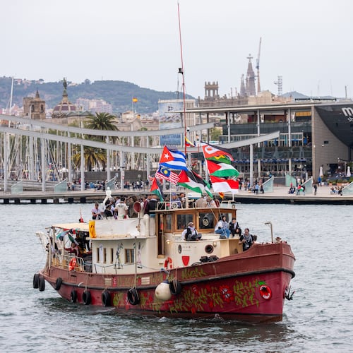 Boats carrying activists and humanitarian aid for Palestinians in Gaza reposition in the port during a symbolic send-off as part of the Global Sumud Flotilla, in Barcelona, Spain, Sunday, April 12, 2026. (AP Photo/Joan Mateu Parra)