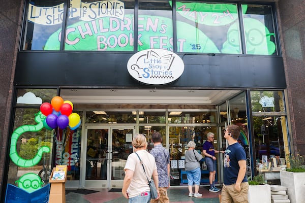 Customers walk into the bookstore for the 20th anniversary celebration of the Little Shop of Stories in Atlanta on Saturday, June 28, 2025. (Abbey Cutrer/AJC)