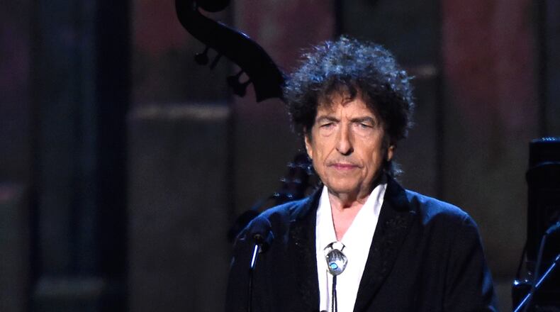 LOS ANGELES, CA - FEBRUARY 06: Honoree Bob Dylan appears onstage at the 25th anniversary MusiCares 2015 Person Of The Year Gala honoring Bob Dylan at the Los Angeles Convention Center on February 6, 2015 in Los Angeles, California. The annual benefit raises critical funds for MusiCares' Emergency Financial Assistance and Addiction Recovery programs. (Photo by Frazer Harrison/Getty Images) Fresh from his MusiCares honor, Bob Dylan has announced a tour. Photo: Getty Images.