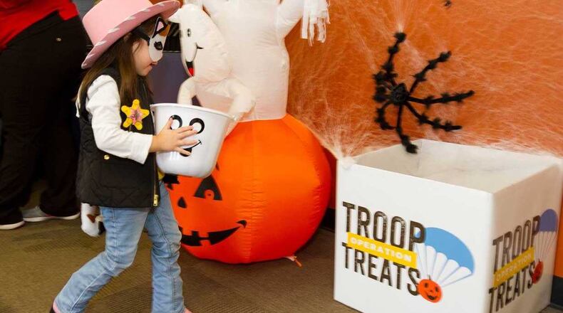 All over metro Atlanta, there are Kool Smiles offices that want to give children toys in exchange for their Halloween candy.